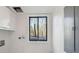 Practical laundry room with cabinets and a window offering natural light at 4013 Brenteresa Ct, Snellville, GA 30039