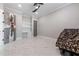 Spacious bedroom featuring marble floors, built-in shelves, and ample natural light at 1011 Nours Cir, Lawrenceville, GA 30045