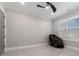 Bright bedroom with a ceiling fan and marble flooring at 1011 Nours Cir, Lawrenceville, GA 30045