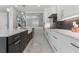 Newly remodeled kitchen with marble countertops and stainless steel appliances at 1011 Nours Cir, Lawrenceville, GA 30045
