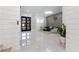 Open-concept living room featuring stylish furniture, and a view to the front entry at 1011 Nours Cir, Lawrenceville, GA 30045