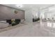 Spacious open-concept living room featuring marble floors, and a view to other living spaces at 1011 Nours Cir, Lawrenceville, GA 30045