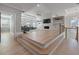 Open concept living room with hardwood floors, recessed lighting, and staircase at 1011 Nours Cir, Lawrenceville, GA 30045