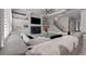 Living room with marble floors, fireplace, TV and open staircase in a bright, modern space at 1011 Nours Cir, Lawrenceville, GA 30045