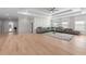 Spacious living room with hardwood floors, neutral-colored walls, and modern furnishings at 1011 Nours Cir, Lawrenceville, GA 30045