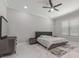 Main bedroom with a ceiling fan, marble floors, and a neutral color scheme at 1011 Nours Cir, Lawrenceville, GA 30045