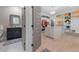 Custom walk-in closet with ample storage space, dressing island, and bathroom access at 1011 Nours Cir, Lawrenceville, GA 30045