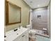 Stylish bathroom with a tiled shower and a modern vanity at 5160 Bucknell Trce, Cumming, GA 30028