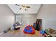 ' bedroom featuring a glider chair, spider-Personal beanbag, and neutral walls at 5160 Bucknell Trce, Cumming, GA 30028
