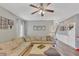 Inviting living room with hardwood floors, a sectional sofa, and decorative wall decor at 5160 Bucknell Trce, Cumming, GA 30028