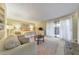 Bedroom with a sitting area, plush sofa, carpet, and access to the balcony at 66 Goldrush Ne Cir, Atlanta, GA 30328