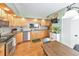 Kitchen with hardwood floors, stainless steel appliances, and granite countertops at 66 Goldrush Ne Cir, Atlanta, GA 30328