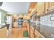 Bright kitchen with granite countertops, stainless steel appliances, and ample storage at 66 Goldrush Ne Cir, Atlanta, GA 30328