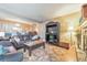 Open floor plan with living area and dining room, showcasing a fireplace and plush furniture at 66 Goldrush Ne Cir, Atlanta, GA 30328