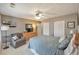 Relaxing bedroom featuring plush bedding, soft lighting, ample storage, and a comfortable sitting area at 66 Goldrush Ne Cir, Atlanta, GA 30328