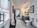Bright bathroom with a double vanity and modern fixtures at 236 Barfield Sw Ave, Atlanta, GA 30310