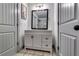 Bathroom with modern vanity, updated fixtures, and tile flooring at 236 Barfield Sw Ave, Atlanta, GA 30310
