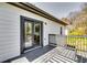 Stylish deck off the primary bedroom provides outdoor relaxation at 236 Barfield Sw Ave, Atlanta, GA 30310