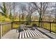 Outdoor deck with views of trees with table and chairs at 236 Barfield Sw Ave, Atlanta, GA 30310