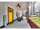 Inviting front porch with ceiling fans and cozy seating area, great for enjoying the outdoors at 236 Barfield Sw Ave, Atlanta, GA 30310