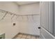 Clean laundry room with storage shelves at 236 Barfield Sw Ave, Atlanta, GA 30310