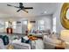 Cozy living room featuring chic seating arrangements, a rustic coffee table, and hardwood floors at 236 Barfield Sw Ave, Atlanta, GA 30310