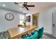 Home office featuring modern ceiling fan, neutral walls, and wood desk at 236 Barfield Sw Ave, Atlanta, GA 30310