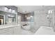 Modern bathroom with standalone tub, glass-enclosed shower, and double vanity at 25 Sherman Nw Ln, Cartersville, GA 30121