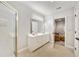 Bright bathroom features double sink vanity, walk-in shower with glass door, and neutral color palette at 25 Sherman Nw Ln, Cartersville, GA 30121