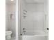 Bathroom with a white subway tile shower and tub combination and marble-look floor at 25 Sherman Nw Ln, Cartersville, GA 30121