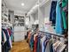 Spacious walk-in closet with custom shelving and hanging rods, perfect for organization and storage at 25 Sherman Nw Ln, Cartersville, GA 30121