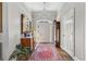 Inviting entryway with hardwood floors, elegant chandelier, and beautiful Persian rug at 25 Sherman Nw Ln, Cartersville, GA 30121
