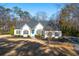 Charming single-story home with manicured lawn, blue door and dark shutters at 25 Sherman Nw Ln, Cartersville, GA 30121