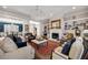Spacious living room with hardwood floors, fireplace and chandelier at 25 Sherman Nw Ln, Cartersville, GA 30121