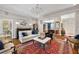 Bright and airy living room with hardwood floors, fireplace and chandelier at 25 Sherman Nw Ln, Cartersville, GA 30121