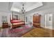Luxurious bedroom with four-poster bed and decorative rug at 25 Sherman Nw Ln, Cartersville, GA 30121