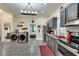 Kitchen featuring new washer and dryer units with adjacent bedroom and bathroom at 833 N Grand Nw Ave, Atlanta, GA 30318