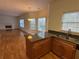 Kitchen with granite countertops and stainless steel sink overlooking the living room at 9560 Knollcrest Blvd, Alpharetta, GA 30022