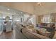 Spacious living room with vaulted ceilings, hardwood floors, and an open concept floor plan at 155 Oakpark Ct, Mcdonough, GA 30253