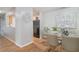 Contemporary dining room adjacent to the kitchen with a glass table and seating for six at 2201 Fairington Village Dr, Lithonia, GA 30038