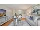Bright living room featuring hardwood floors, stylish decor, and comfortable seating arrangement at 2201 Fairington Village Dr, Lithonia, GA 30038