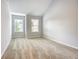 Bright bedroom featuring two windows and neutral carpeting at 3772 Sunbridge Dr, Snellville, GA 30039