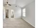 Bedroom with vaulted ceiling, ceiling fan, and view to the bathroom at 3772 Sunbridge Dr, Snellville, GA 30039