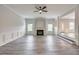 Bright living room boasts a fireplace and stylish trim and plenty of space at 3772 Sunbridge Dr, Snellville, GA 30039