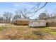 Spacious backyard with grass, and a full outbuilding at 461 Deckner Sw Ave, Atlanta, GA 30310