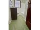 Bathroom featuring tile floors, vanity, toilet, window, and tub with shower at 461 Deckner Sw Ave, Atlanta, GA 30310