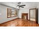 Bright living room with hardwood floors, fireplace, and large window at 461 Deckner Sw Ave, Atlanta, GA 30310