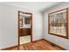 View of dining room featuring hardwood floors and an open layout leading to the kitchen at 461 Deckner Sw Ave, Atlanta, GA 30310