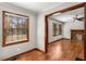 Living room featuring wood trim, hardwood floors, and large windows at 461 Deckner Sw Ave, Atlanta, GA 30310