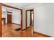 Spacious living room featuring hardwood floors with access to other rooms at 461 Deckner Sw Ave, Atlanta, GA 30310